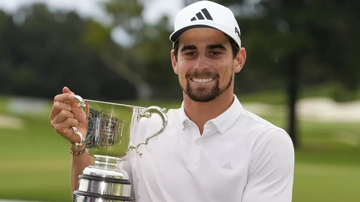 Chile's Joaquin Niemann holds the trophy after winning the Australian Open Golf Championship