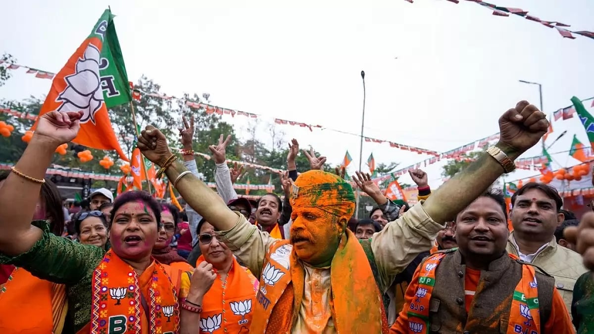BJP supporters celebrate early leads for the party in Jaipur, Rajasthan. - null