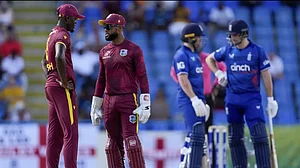 West Indies' captain Shai Hope talks to bowler Alzarri Joseph during 2nd ODI match