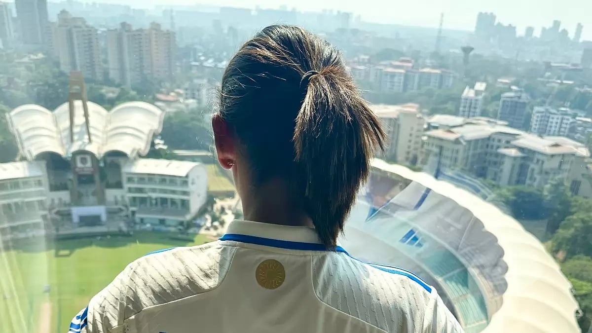  Harmanpreet Kaur poses outside the DY Patil Stadium ahead of the Test between India and England.