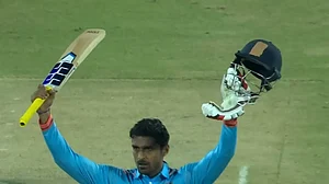 Deepak Hooda celebrates his century in the Vijay Hazare Trophy semi-final against Karnataka.