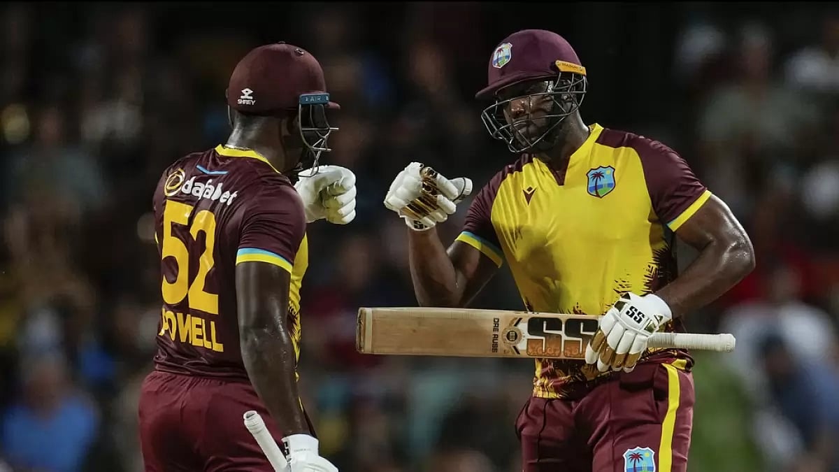 West Indies captain Rovman Powell and Andre Russell celebrating after hitting a boundary against England  - null