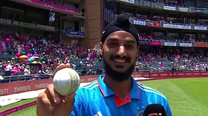 Arshdeep Singh poses with the match ball after scalping five wickets against South Africa