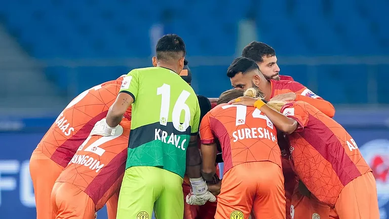 Punjab FC players in a huddle before the match against Kerala Blasters FC in Indian Super League - null