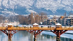 Iconic Landmark: The Zero Bridge with the Himalayas in the backdrop