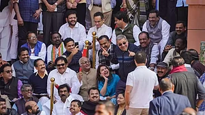 Congress MP Rahul Gandhi meets suspended MPs who were staging a protest outside Parliament