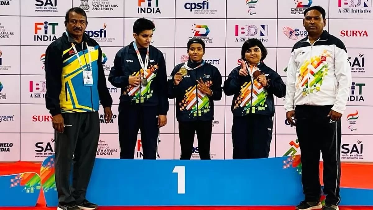 Para athlete Jeetu Kanwar (second from right) on the podium after winning a medal. 