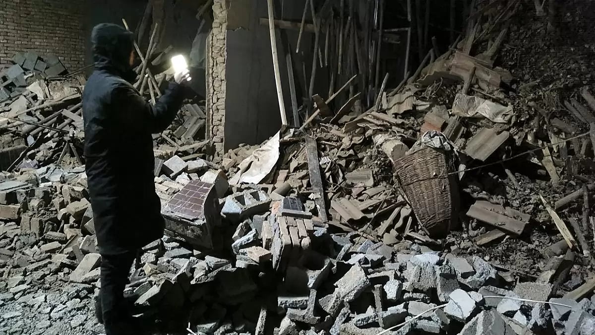 Debris from a wall brought down after the earthquake in northwest Chinas Gansu 