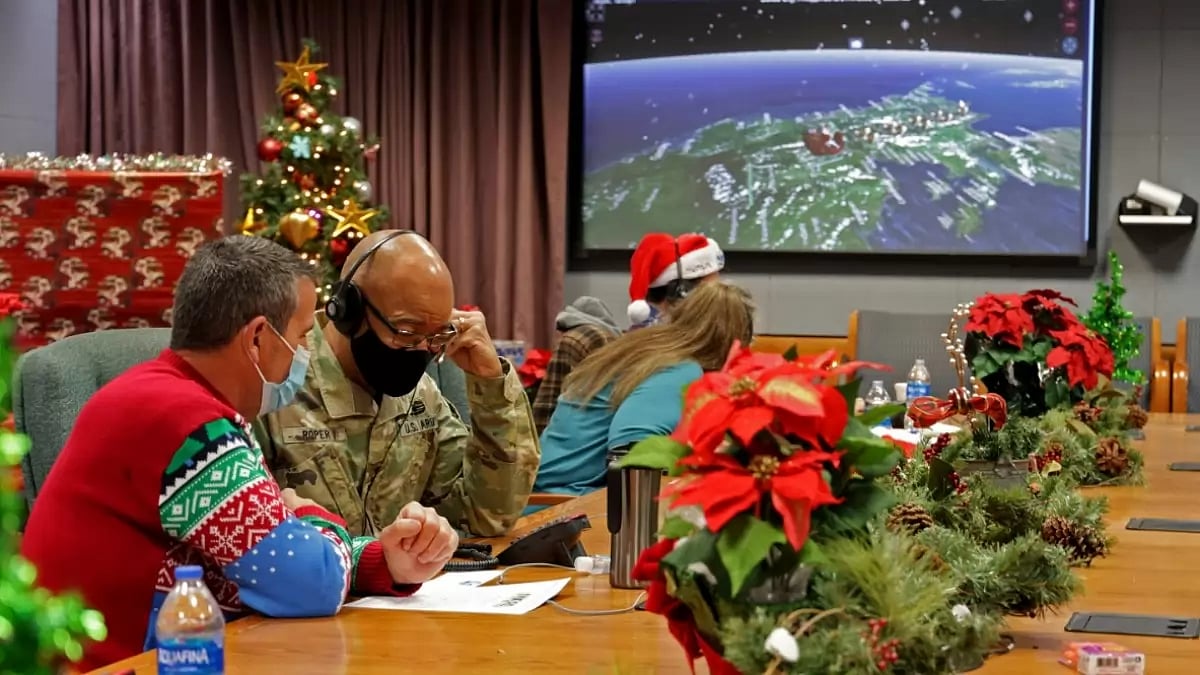 Pic provided by Department of Defense shows volunteers answering phones, emails from children