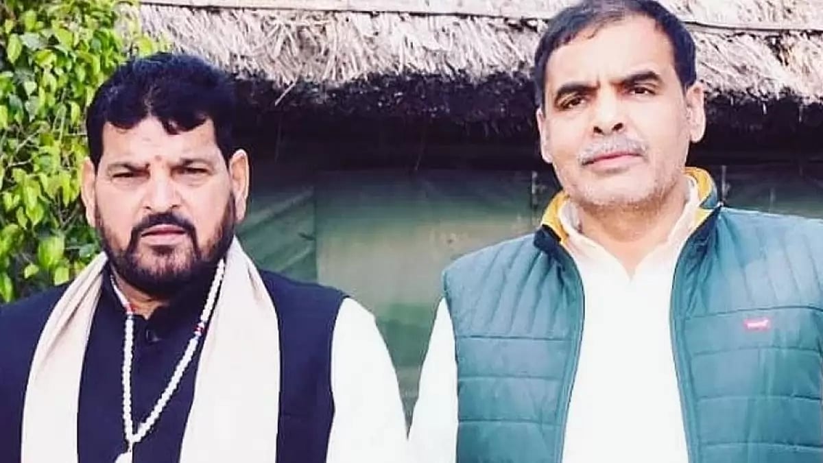 Brij Bhushan Sharan Singh (left) and Sanjay Singh (right)
