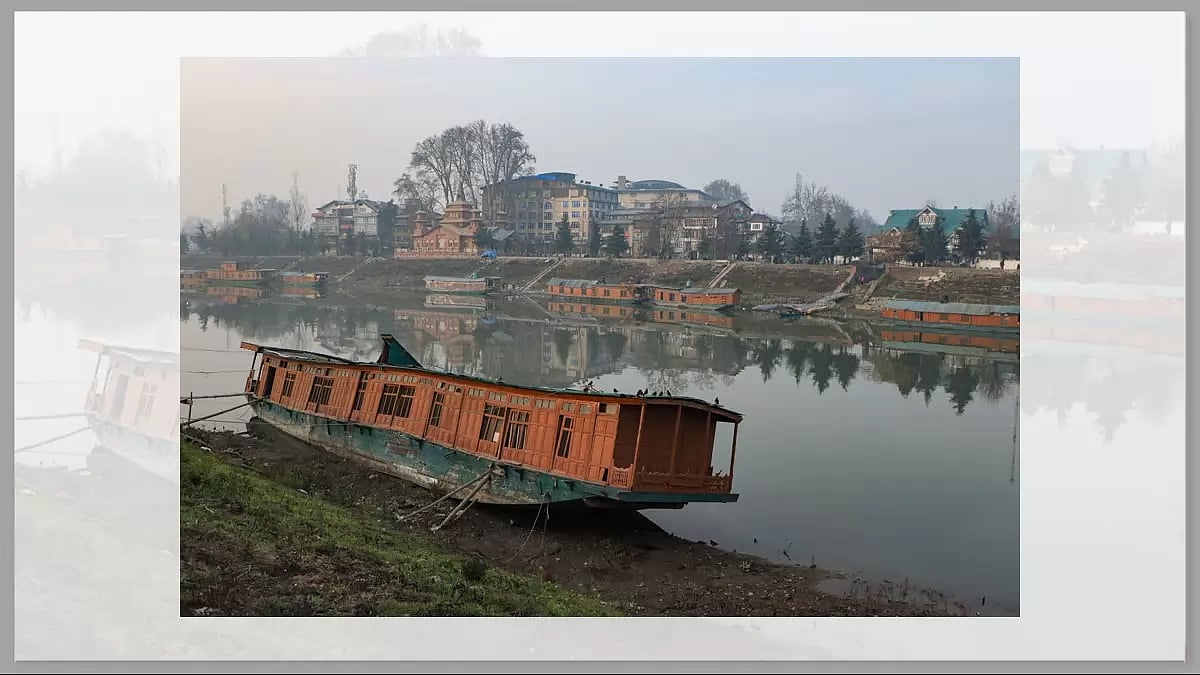 A view of a sunken residential houseboat that belongs to Abdul Khaliq, in river Jhelum in Srinagar.