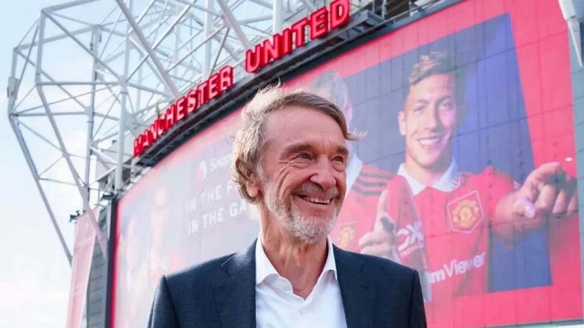 File image of Sir Jim Ratcliffe standing outside Manchester United's Old Trafford stadium.