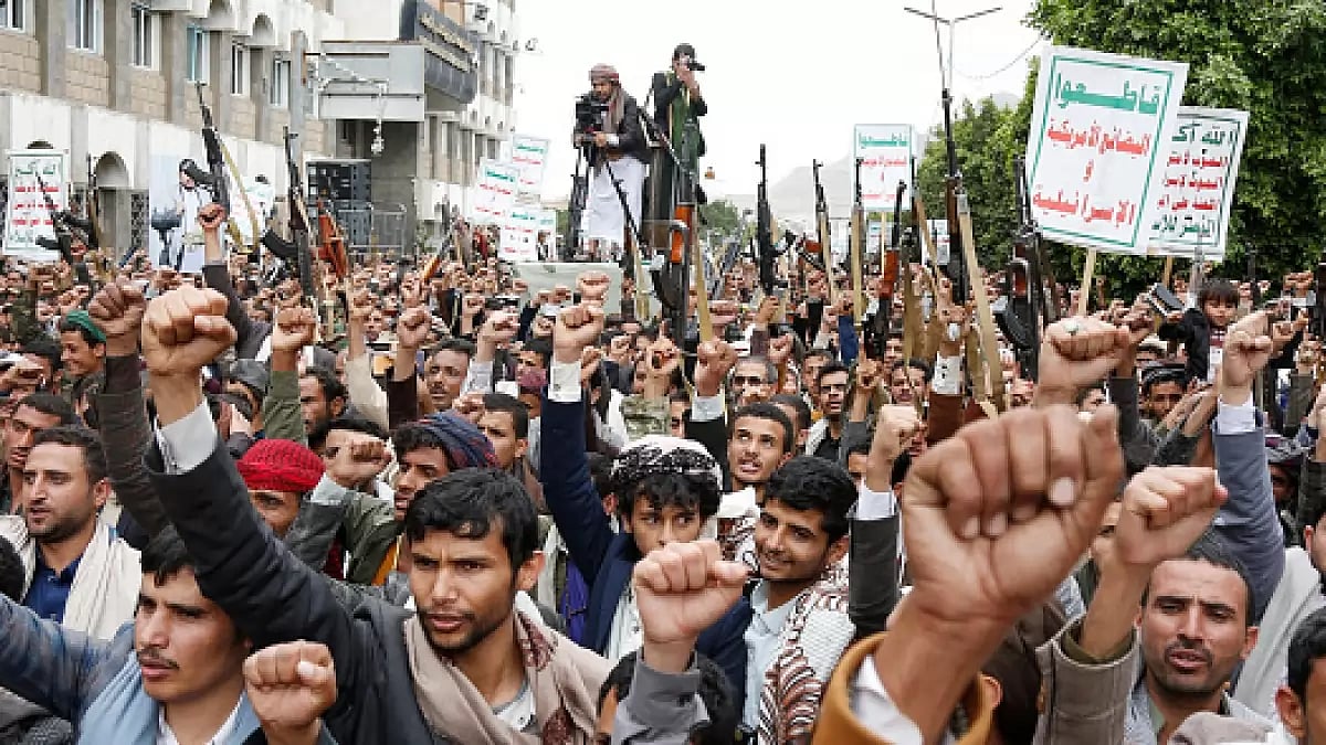 Houthi supporters chants slogans on the street