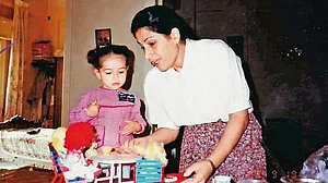 Past Perfect: Zainab Al Ghonaimy with her daughter Farah at their home in Gaza