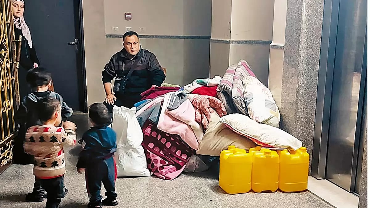 In Transit: Zak and his family during his  journey from north of Gaza to the southern part