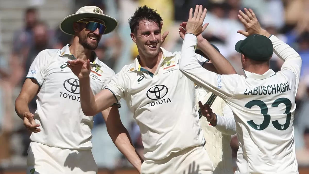 Australian players celebrate a wicket on day 2 of the MCG Test
