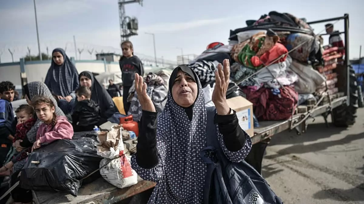 Palestinian Hudair family members on their way to Rafah hoping to find safer place