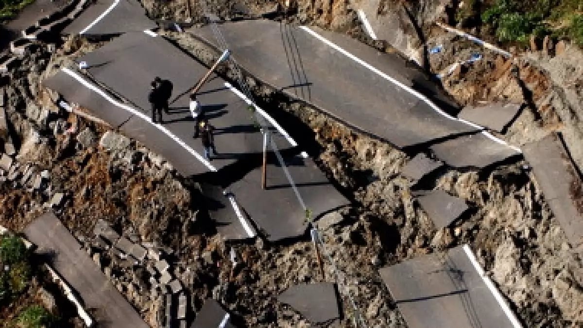 Damaged roads and debris following the Chutes Earthquake in 2004