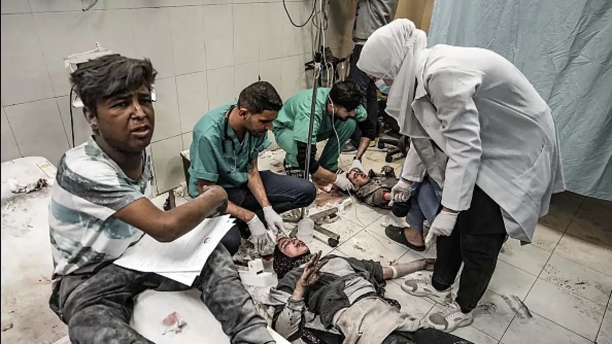 Injured Palestinian people, including children as a result of Israeli attacks are taken to the Nasse