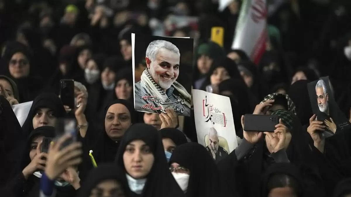 AP : Mourners attend a ceremony marking anniversary of the death of the late Gen. Qassem Soleimani |