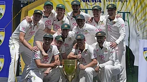 Australia cricket team posing with the winning trophy