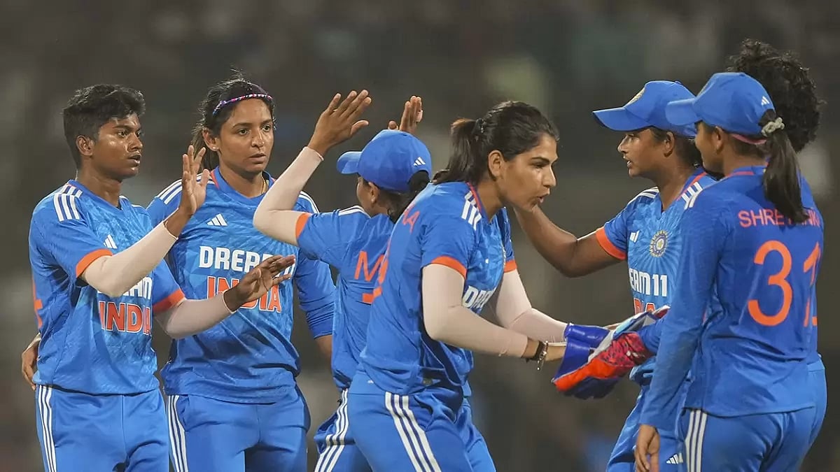 Pooja Vastrakar celebrates the wicket of Ashleigh Gardner during the 2nd T20I cricket match between India and Australia, at DY Patil stadium in Navi Mumbai.