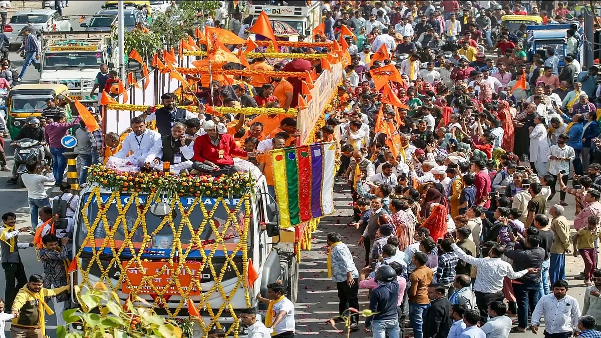 Devotees take part in procession taken out to transport a 'flag pole' to be fixed at Ayodhya temple