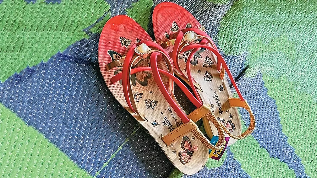 The sandals belonging to the nineteen-year-old Dalit girl who had been raped by upper caste men in Hathras in 2020 