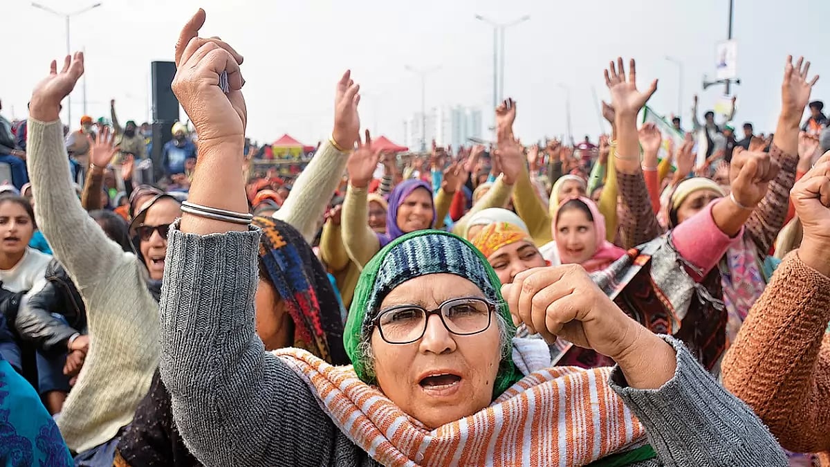 Women raise slogans during a protest in 2021 against farm laws in Ghazipur (Delhi-UP border)