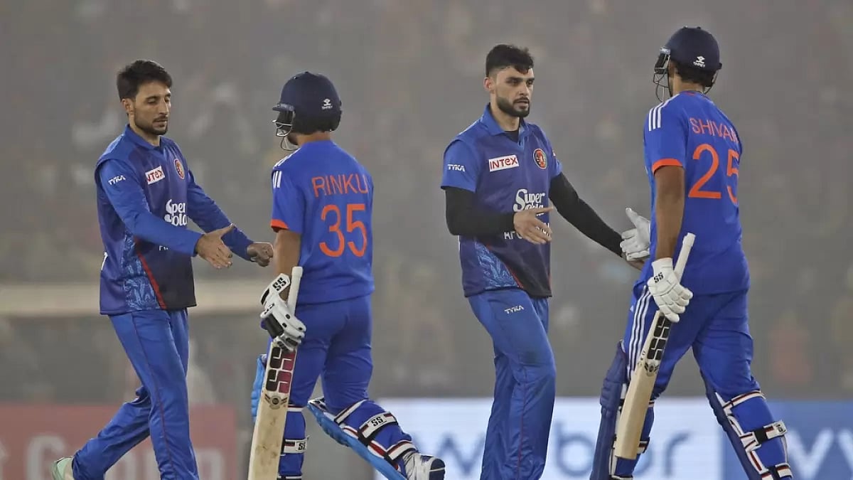 Indian players shaking hands with Afghanistan's players after India won the match by 6 wickets in 1st T20I in Mohali