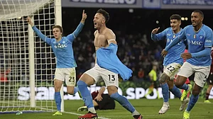 Amir Rrahmani (C) celebrates after scoring a goal during the Italian Serie A football match between Napoli and Salernitana at the Diego Armando Maradona stadium in Naples, Italy.
