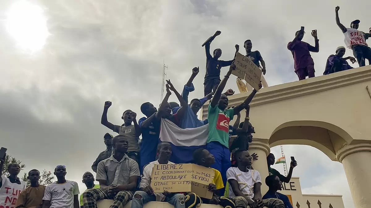 Supporters of Nigers ruling junta gather at the start of a protest called to fight for the countrys freedom and push back against foreign interference in Niamey, Niger. The march falls on the West African nations independence day from its former colonial ruler, France, and as anti-French sentiment spikes, more than one week after mutinous soldiers ousted the countrys democratically elected president.