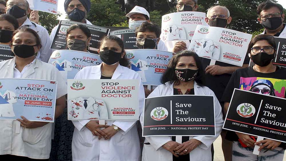 Doctors of Indian Medical Association (IMA) hold placards during a nationwide protest, demanding a central law to protect doctors against violence, in Gurugram.