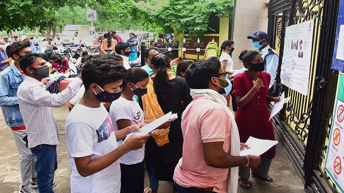 Students outside a NEET examination centre. 