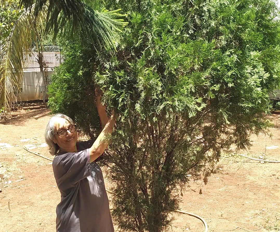 Indira J in her garden
