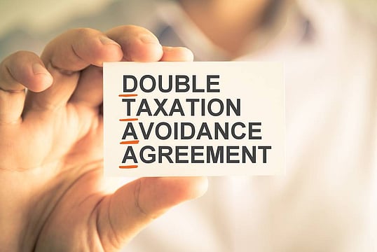 How NRIs Can Escape Double Taxation: Guide To DTAA Benefits