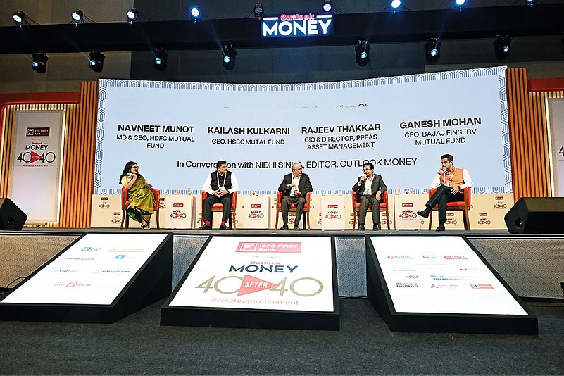 (R to L) Ganesh Mohan, CEO, Bajaj Finserv Asset Management; Rajeev Thakkar, CIO and Director, PPFAS Asset Management; Kailash Kulkarni, CEO, HSBC Mutual Fund; Navneet Munot, MD and CEO, HDFC Asset Management; Moderator: Nidhi Sinha, Editor, Outlook Money