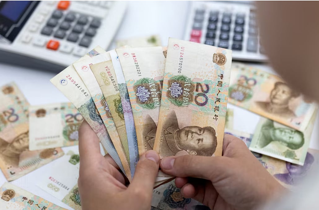 Reuters : US-China Trade War Escalates: Yuan Closes Lowest Since 2007 
