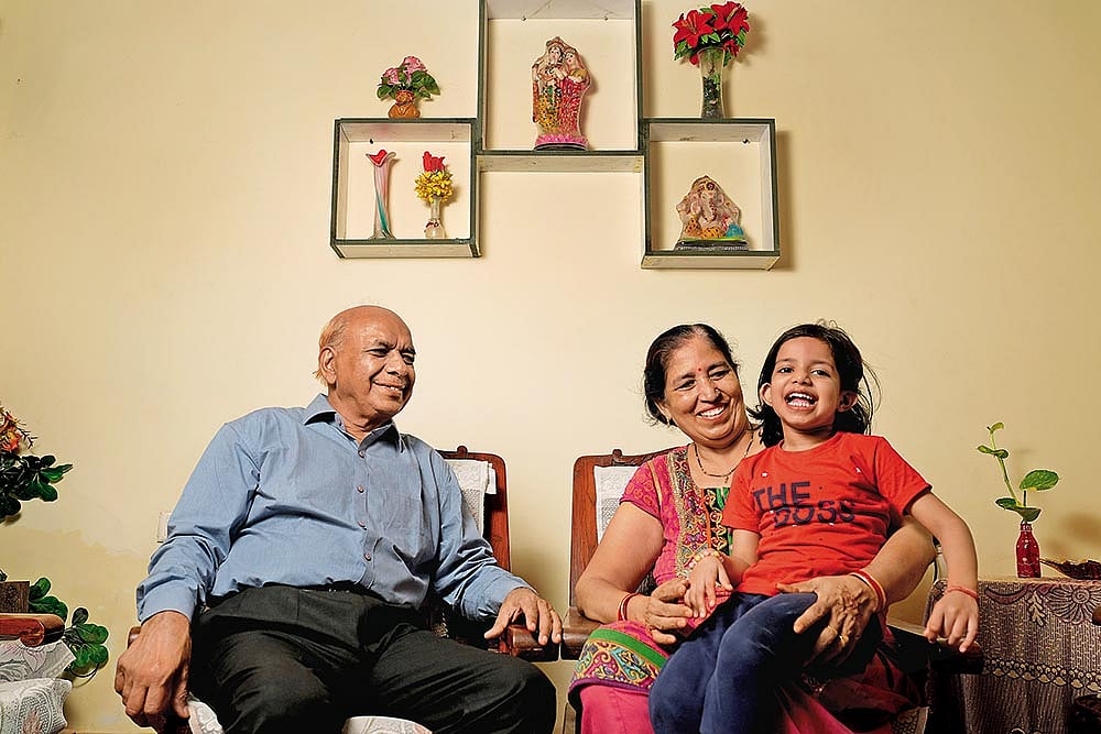 | Photo: Suresh Pandey : Pramod Agrawal with his wife and granddaughter, Ghaziabad