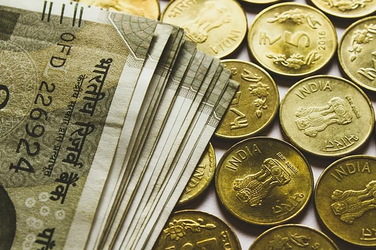 Rupee rises 10 paise - null