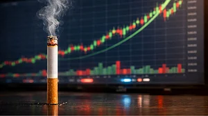 Higher Cigarette Costs Burn Smokers Pockets, Light Up Investors Returns
