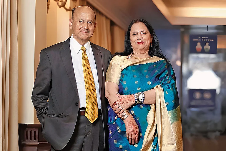 Dr Kuldeep Singh, 68, and his wife Sarita Salathia, 63 Dr Singh took up a job 2-3 years post retirement as he felt purposeless, while his wife is enjoying her retirement years after having worked as a teacher - null