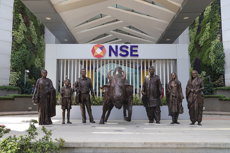 NSE shares make their market debut on BSE at Rs 1,800. - NSE
