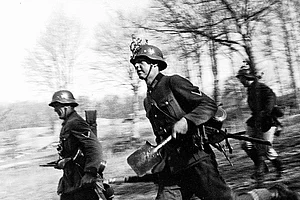 German troops storm into France through Belgium in the north bypassing the heavily-guarded Maginot Line in the east, in the summer of 1940 : German troops storm into France through Belgium in the north bypassing the heavily-guarded Maginot Line in the east, in the summer of 1940