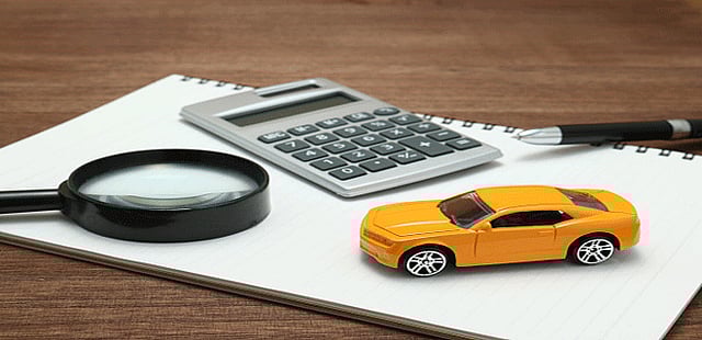 Whom will the insurers pay the claim if there is an outstanding loan on the car?