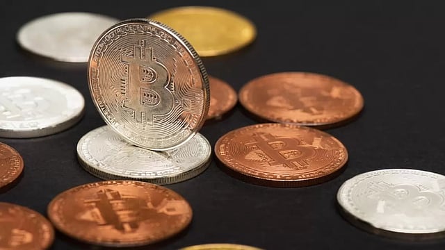 Cryptocurrency Prices Today: Market Retreats 2.7% Amid Sell-off, Dogecoin Gains 5.4%