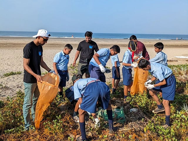 A Morjim Beach clean-up drive with children