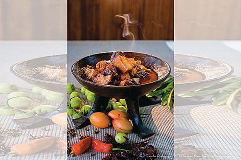 Smoked pork axone is a Naga dish made with pork and fermented soyabean  