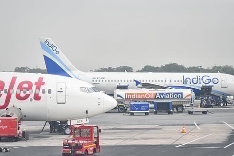 Air-traffic controllers and ground crew managing flights manually after technical failure in Delhi ATC system