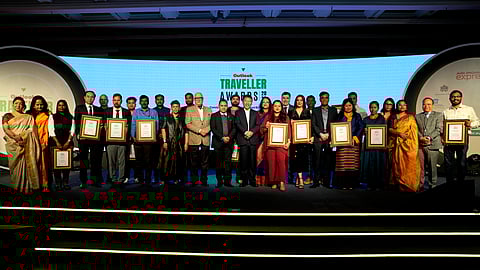 Guests and winners posing on stage at the Outlook Traveller Awards 2025 ceremony